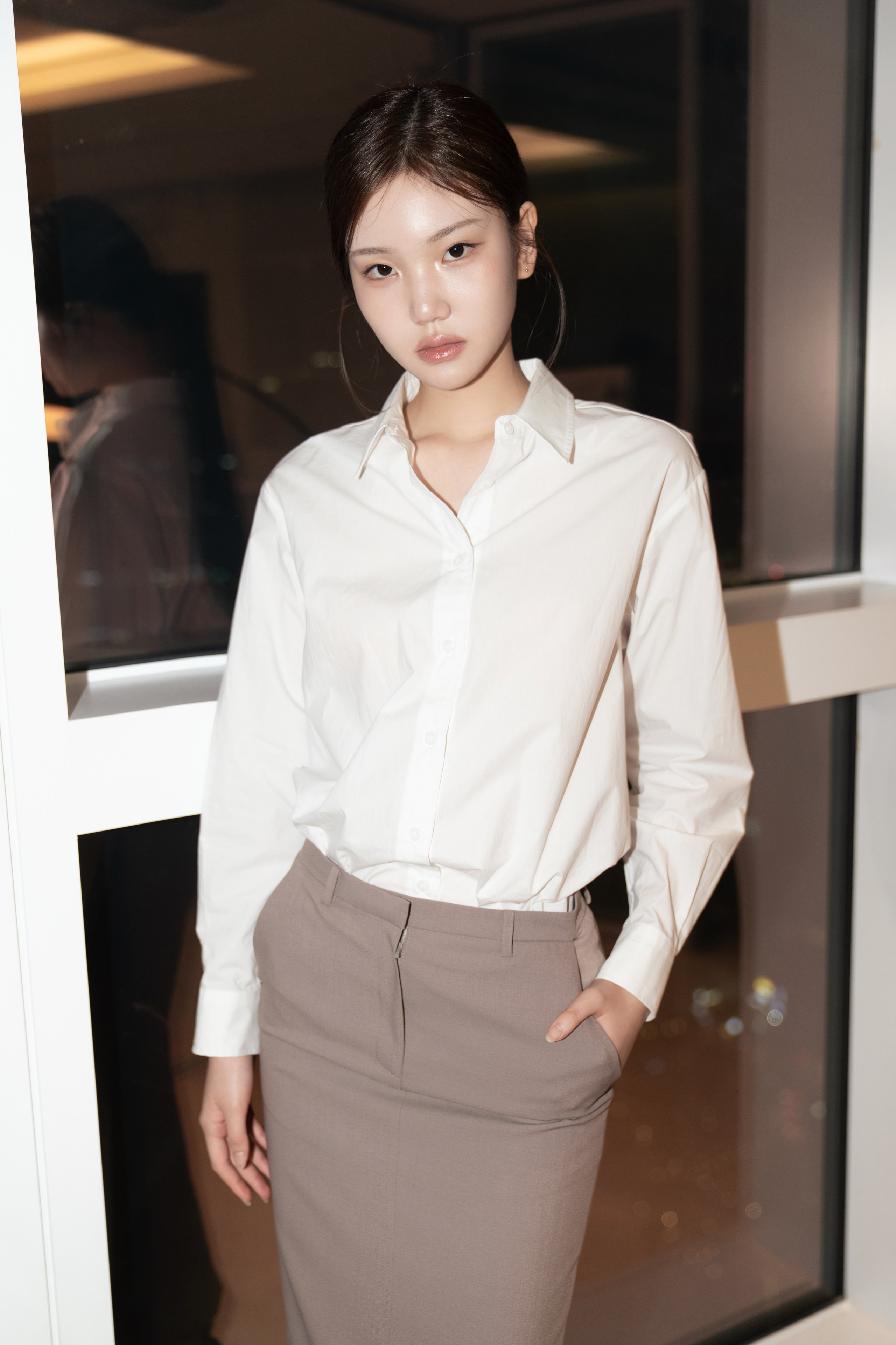The Long-Sleeved Shirt in White with the Long Skirt in Beige