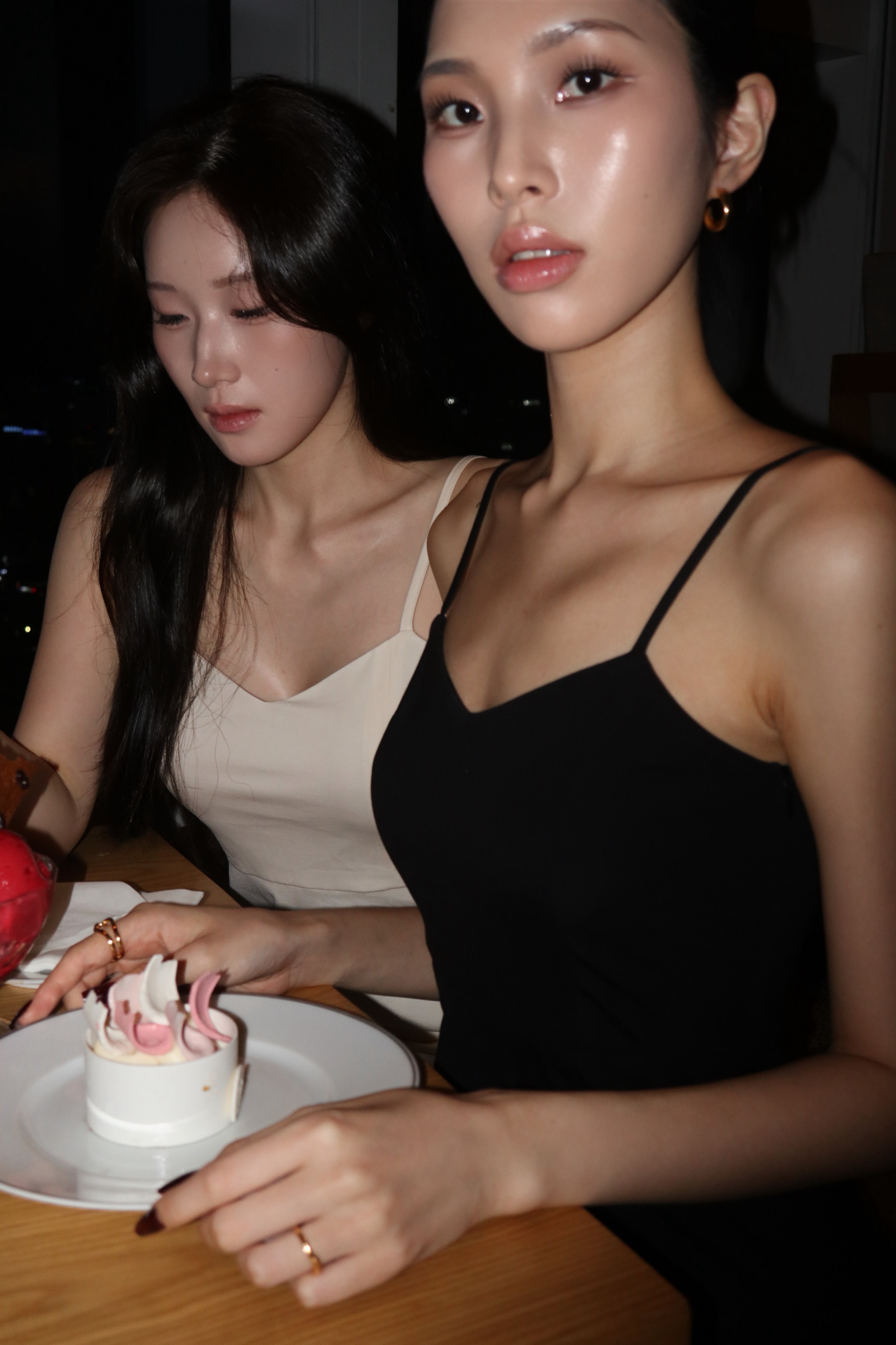 The Mini Slip Dress in Ivory and the Long Slip Dress in Black